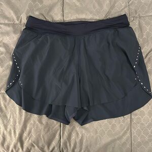 Lululemon navy fast and free midrise shorts. Size 8